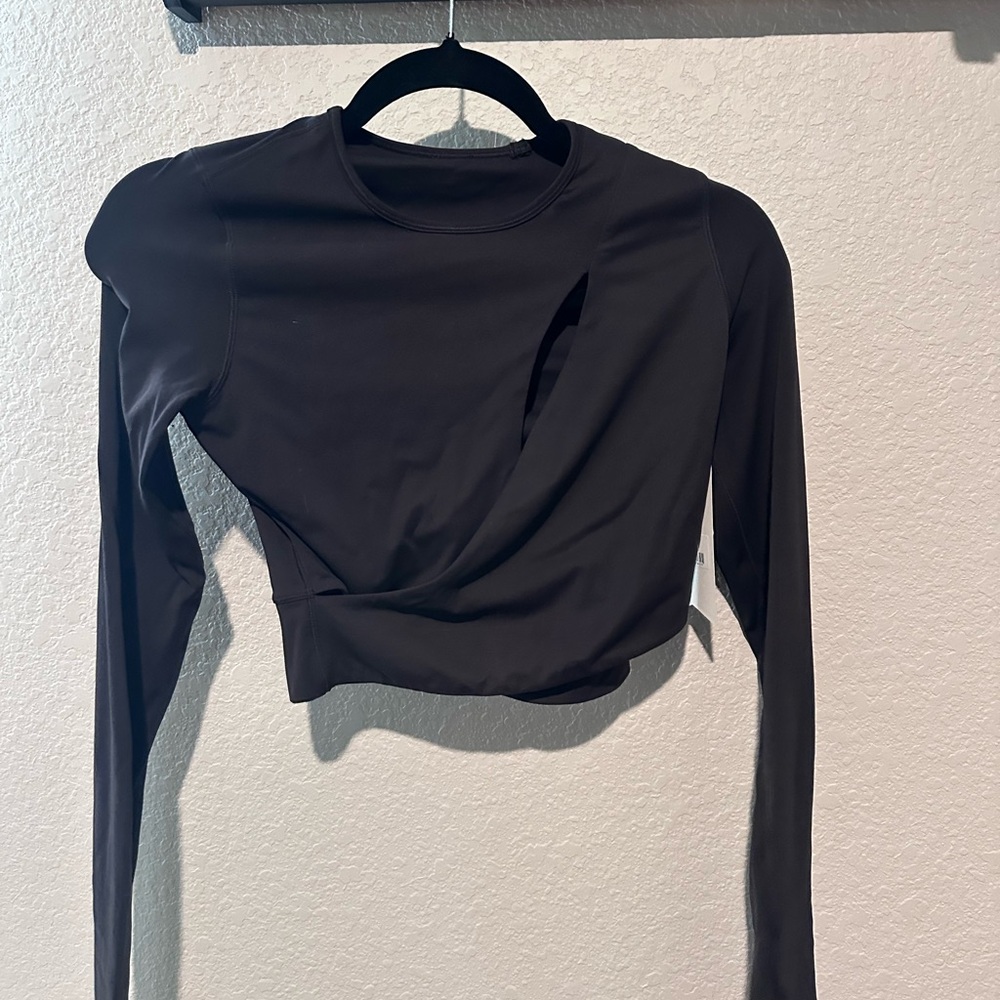 Brand new Stori crop workout wrap top with slit